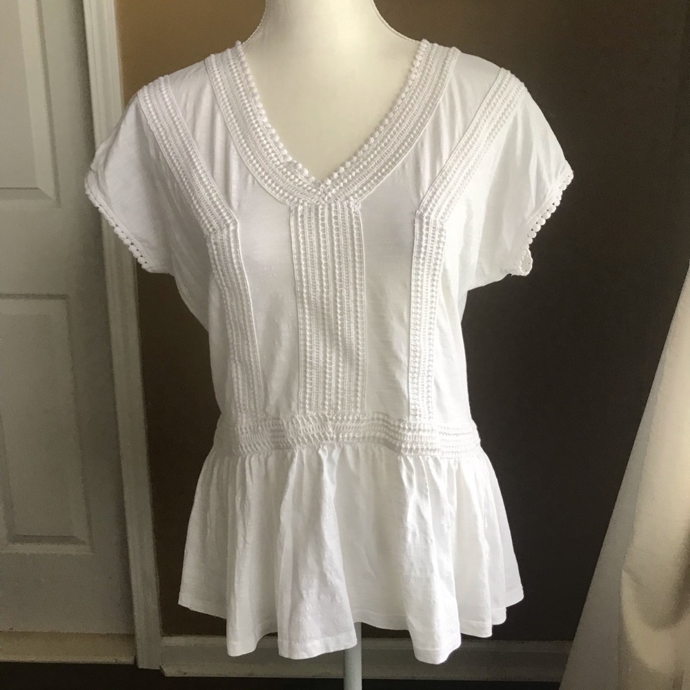 Nice white peplum style top with v-neck